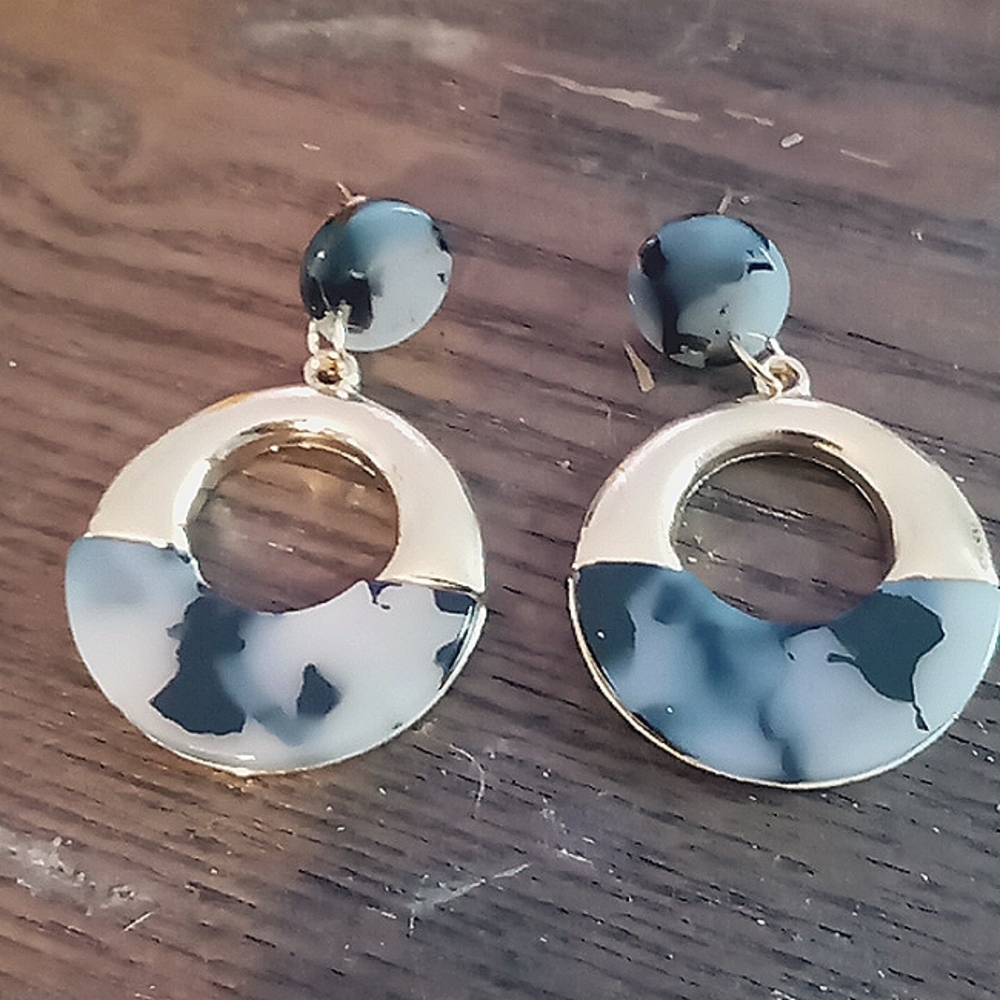 Gold tone and animal print earrings